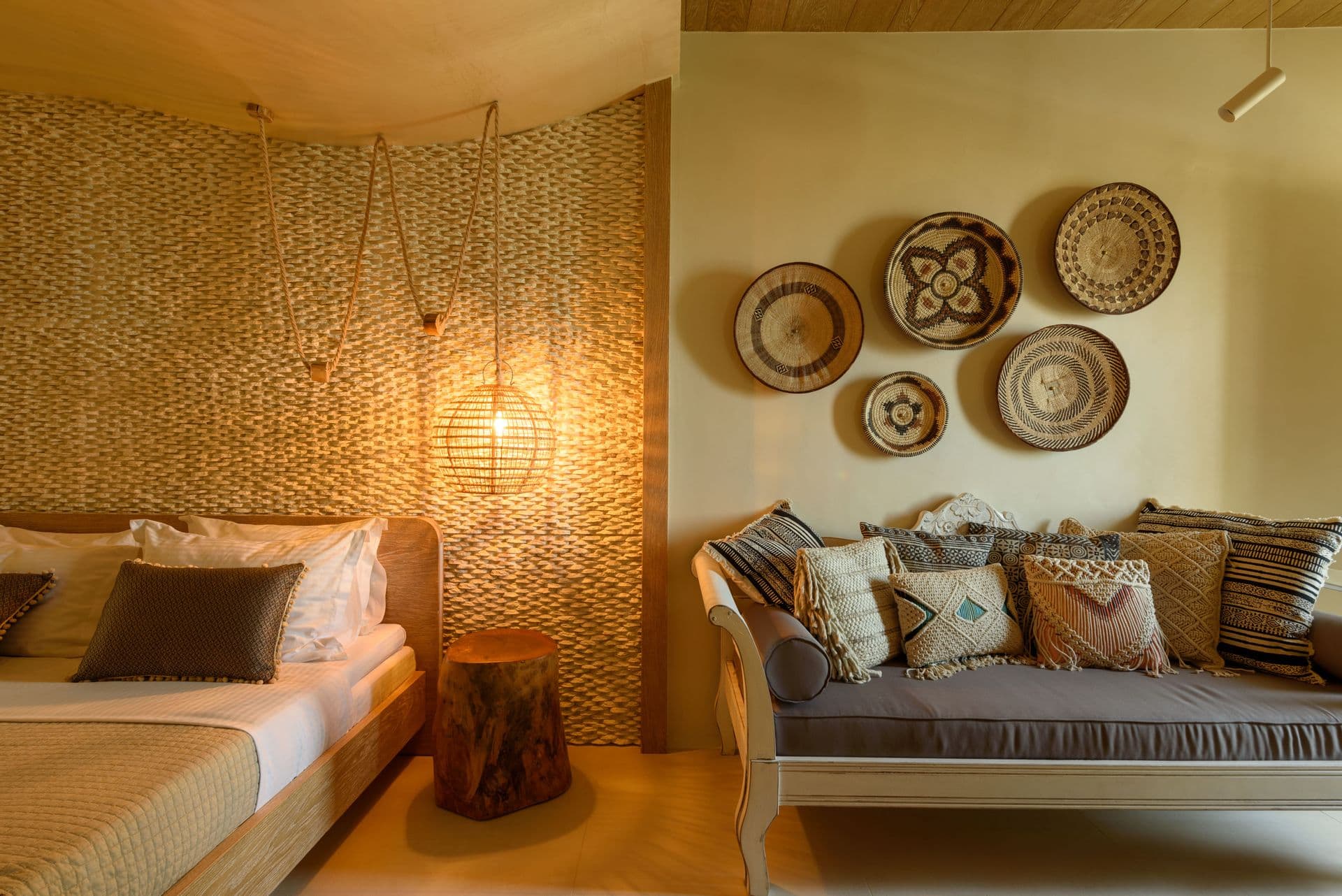 Spacious open plan bedroom with king size bed and sofa bed