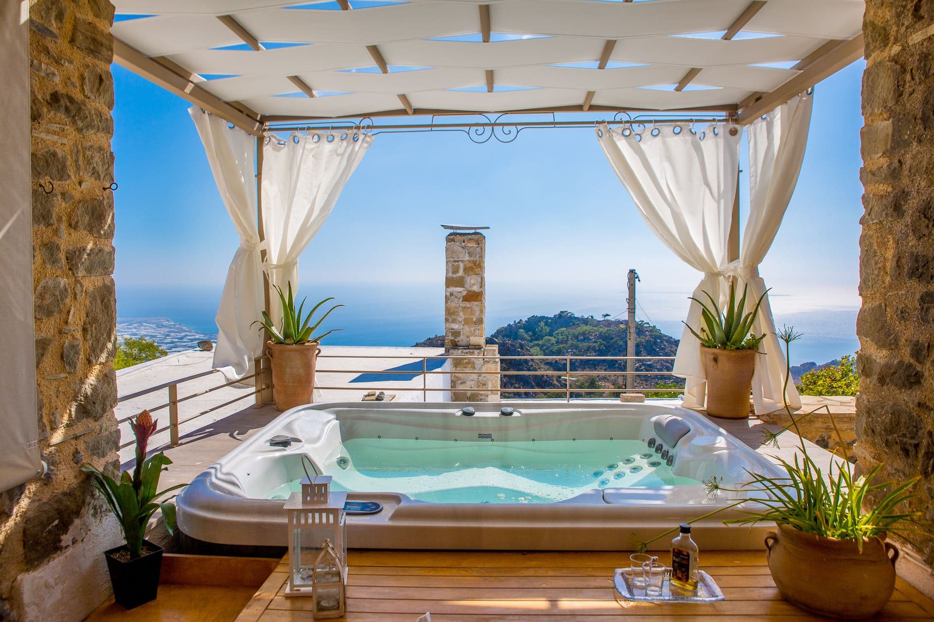 PASIPHAE HOUSE Open Air Jacuzzi in the Courtyard with infinitive views to the Med sea
