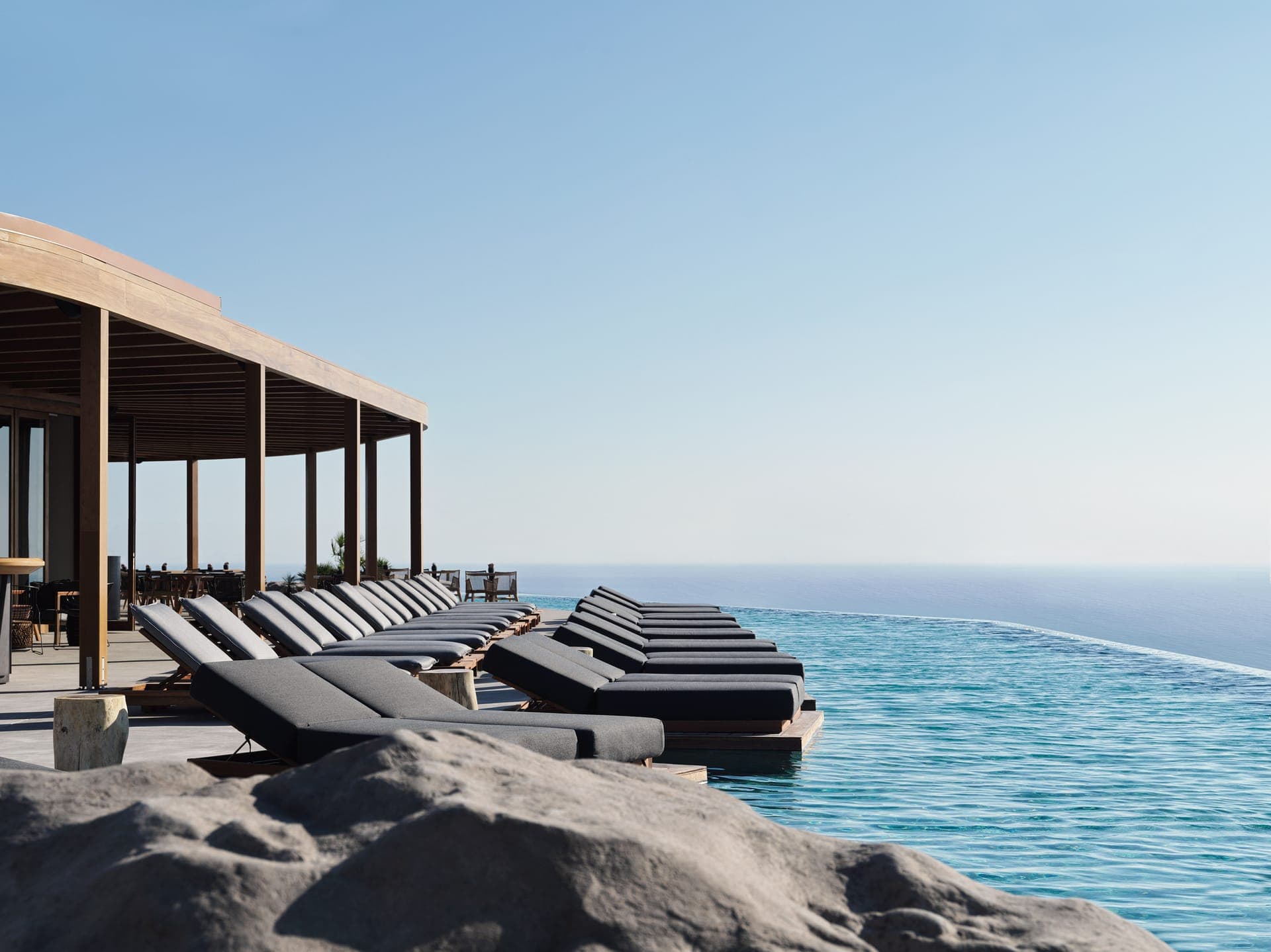 Set on Santorini's northeastern coast snuggled by green vineyards and Aegean Sea views, Magma Resort Santorini stands as the inaugural property of The Unbound Collection by Hyatt in Greece.