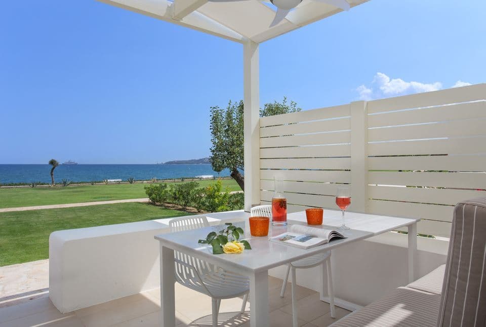 Private terrace | Outdoor seating & dining area with sea view | Superior Suite