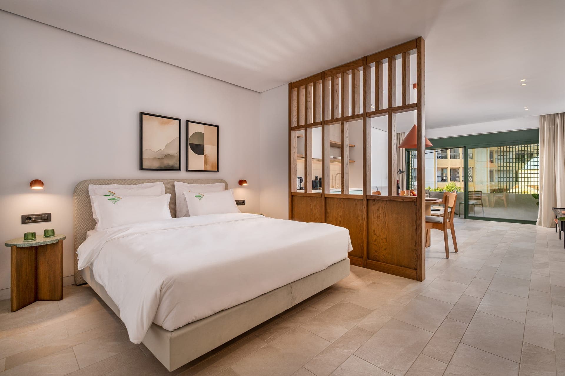 A spacious, stunningly designed room in the heart of the city, showcasing impeccable craftsmanship and luxurious, top-quality finishes.
