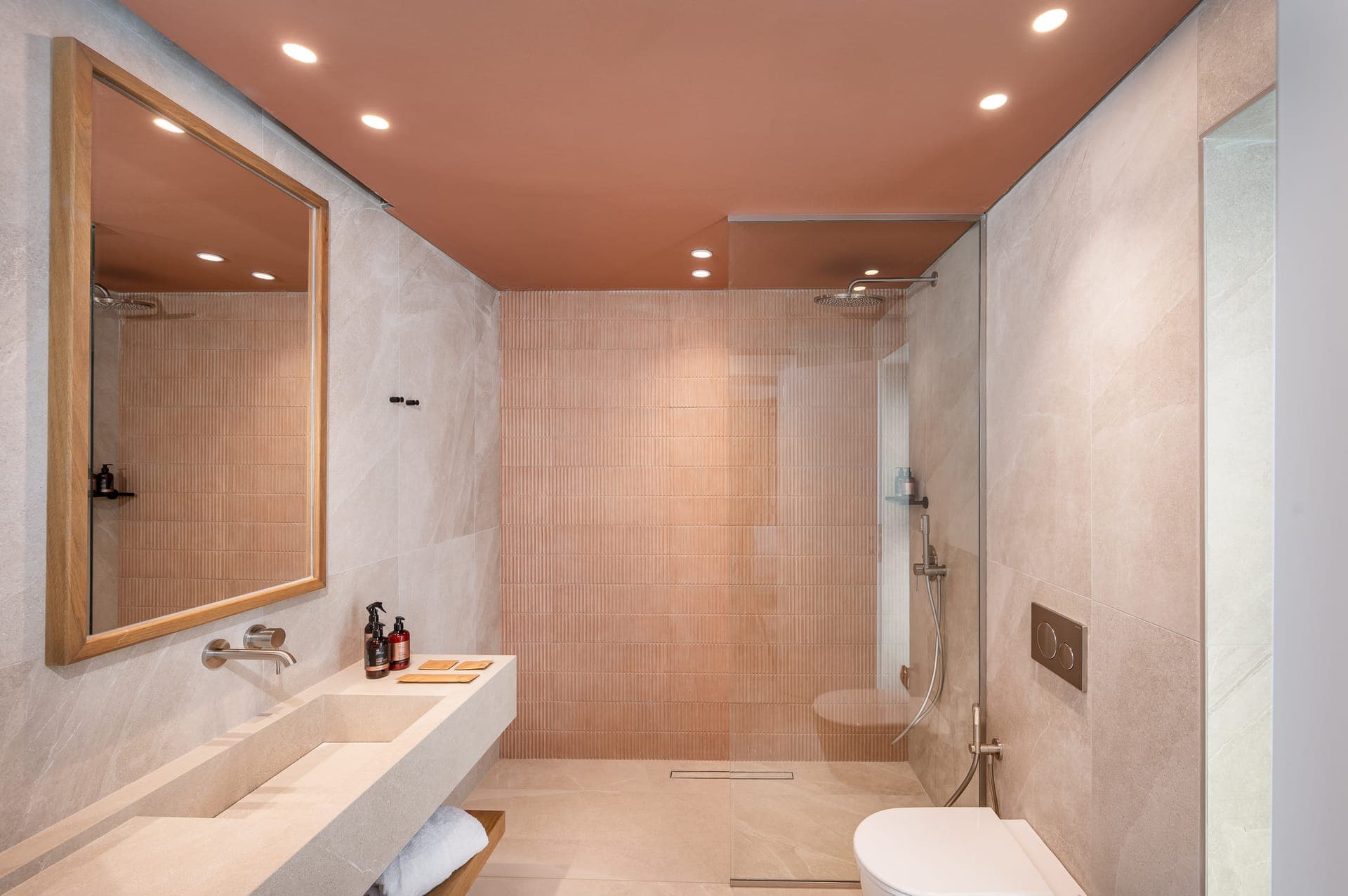 Start your day in style with a walk-in shower featuring stunning colors and elegant designs. Wrap yourself in luxury with plush bathrobes, comfy slippers, and premium cotton essentials, creating the perfect morning vibe!