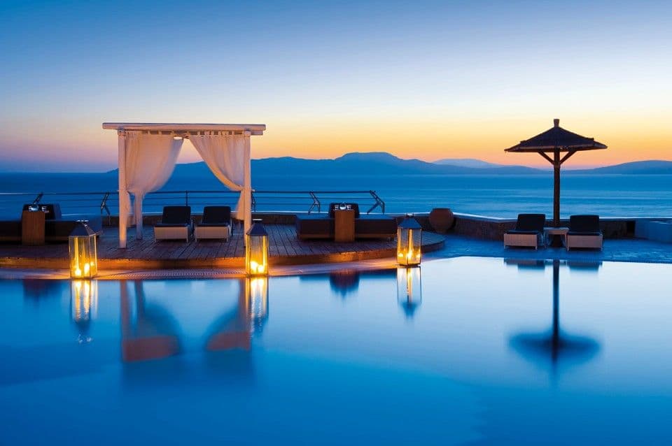 Mykonos Grand Pool Area during sunset