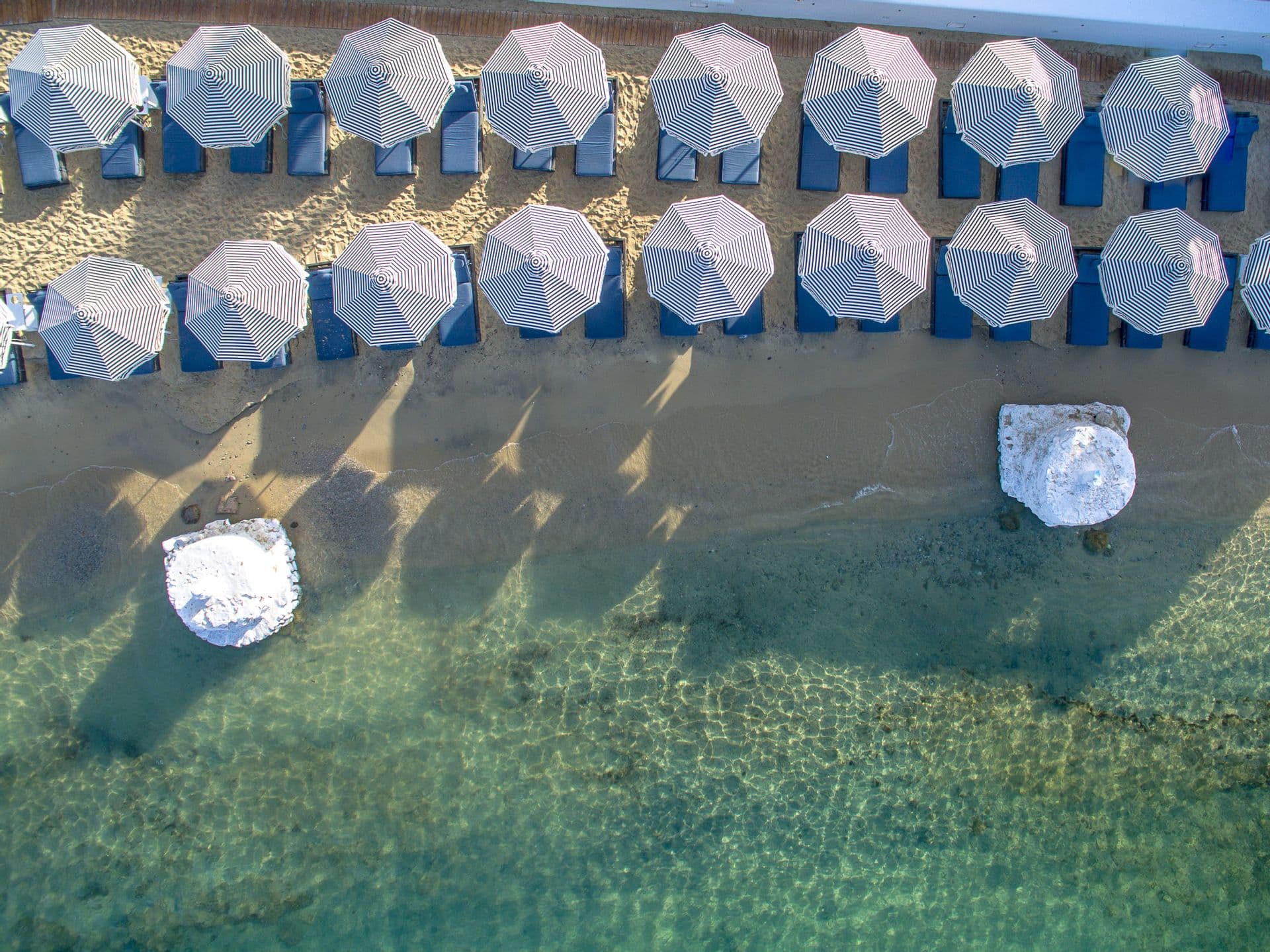 Mykonos Blanc Hotel,beachfront luxury experience. 
Exclusive sunbeds for the hotel guests.