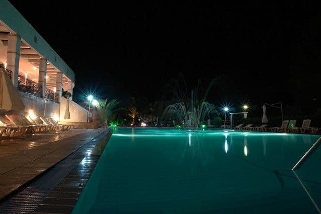 Rema Hotel Vourvourou Chalkidiki Pool by night