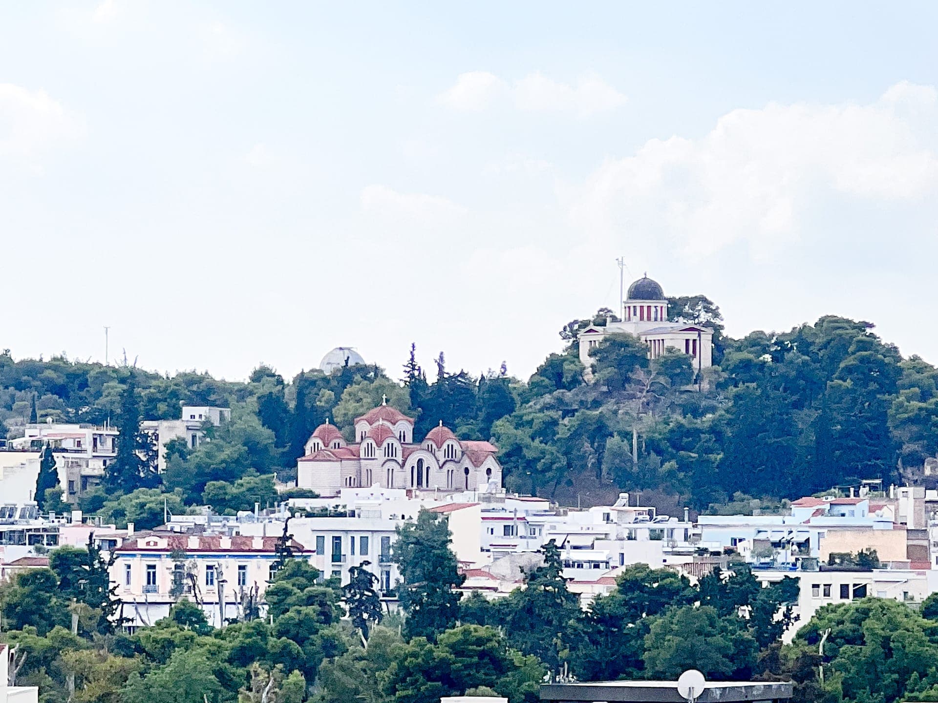 Indulge the looking to the National Conservatory of Greece in one of our Queens Suite balcony.