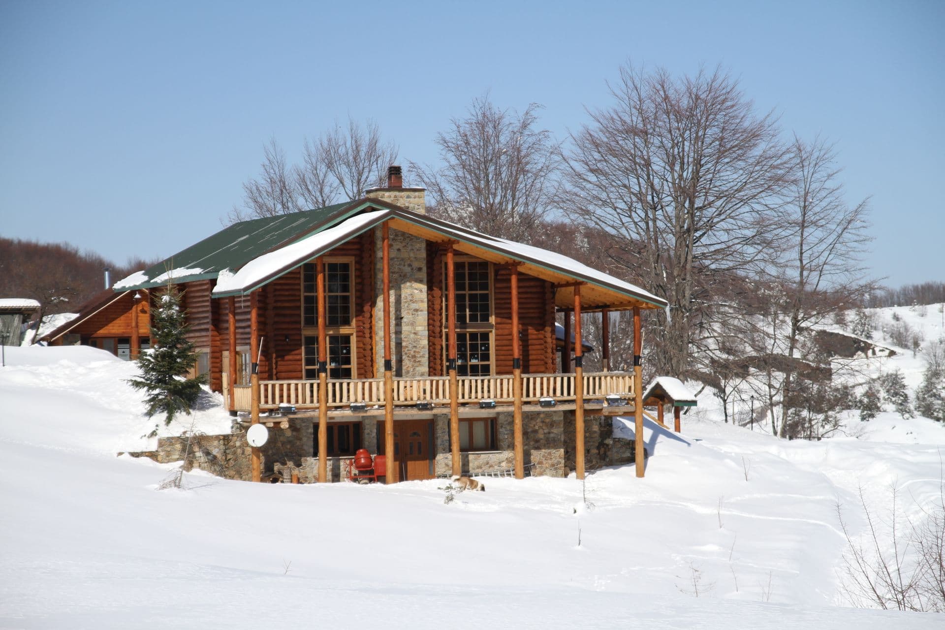 Sfendamos Wood Village is a mountain hotel with 7 individual Chalet Wooden Houses with private fireplaces and a main Chalet with a Restaurant and Bar. Its situated 1.5 klm from the 3-5 Pigadia Ski Resort in a wonderful natural setting.