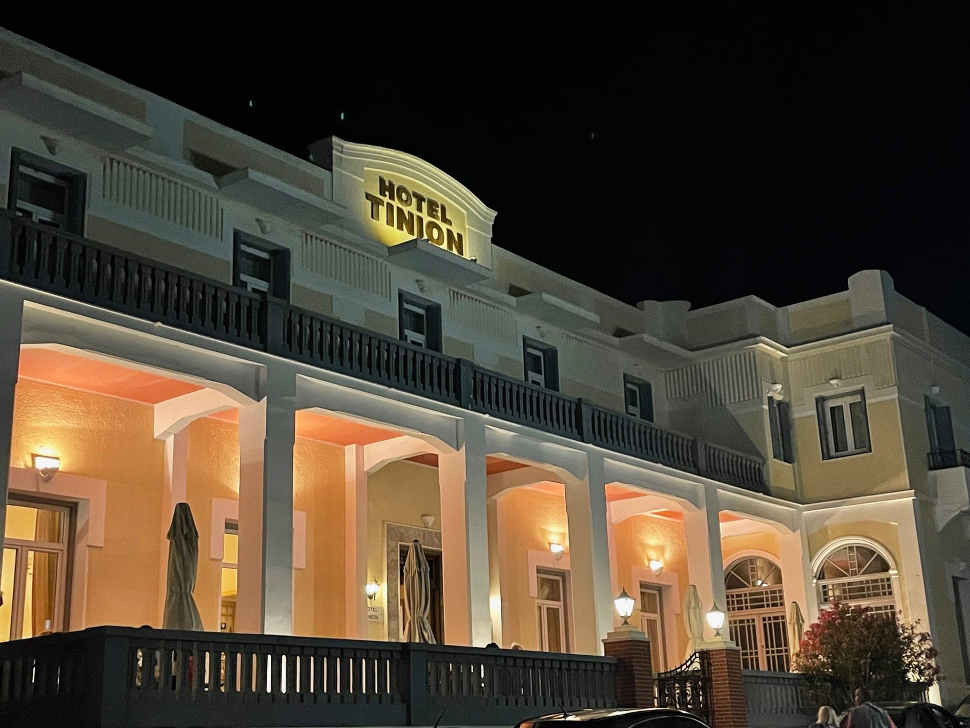 Tinion Hotel by night external view