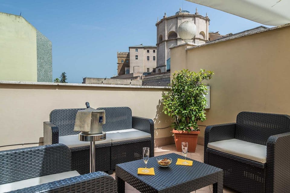 Private balcony overlooking the Vatican Museums Entrance.