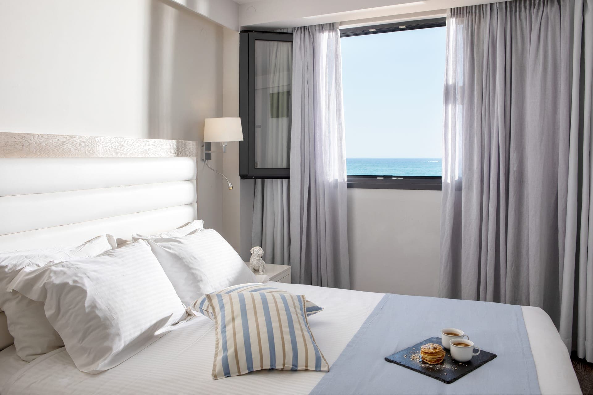 room-types-AMMOSUITES-DLXSV-0.jpg