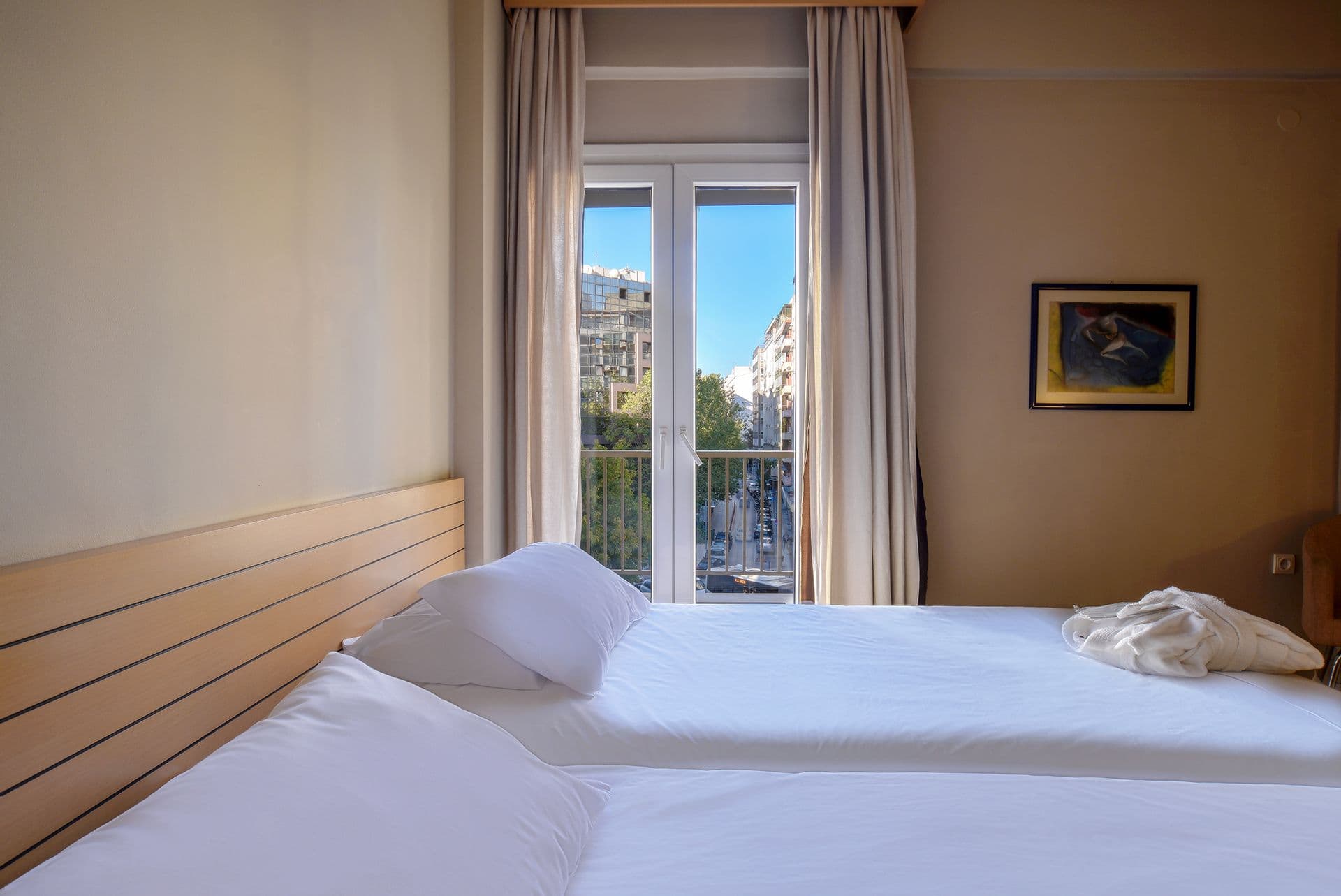 The Double Room City view enjoys great views of the city with a private balcony in light colours and is ideal for your urban stay in downtown Thessaloniki. Approx. size 22 sq meters.