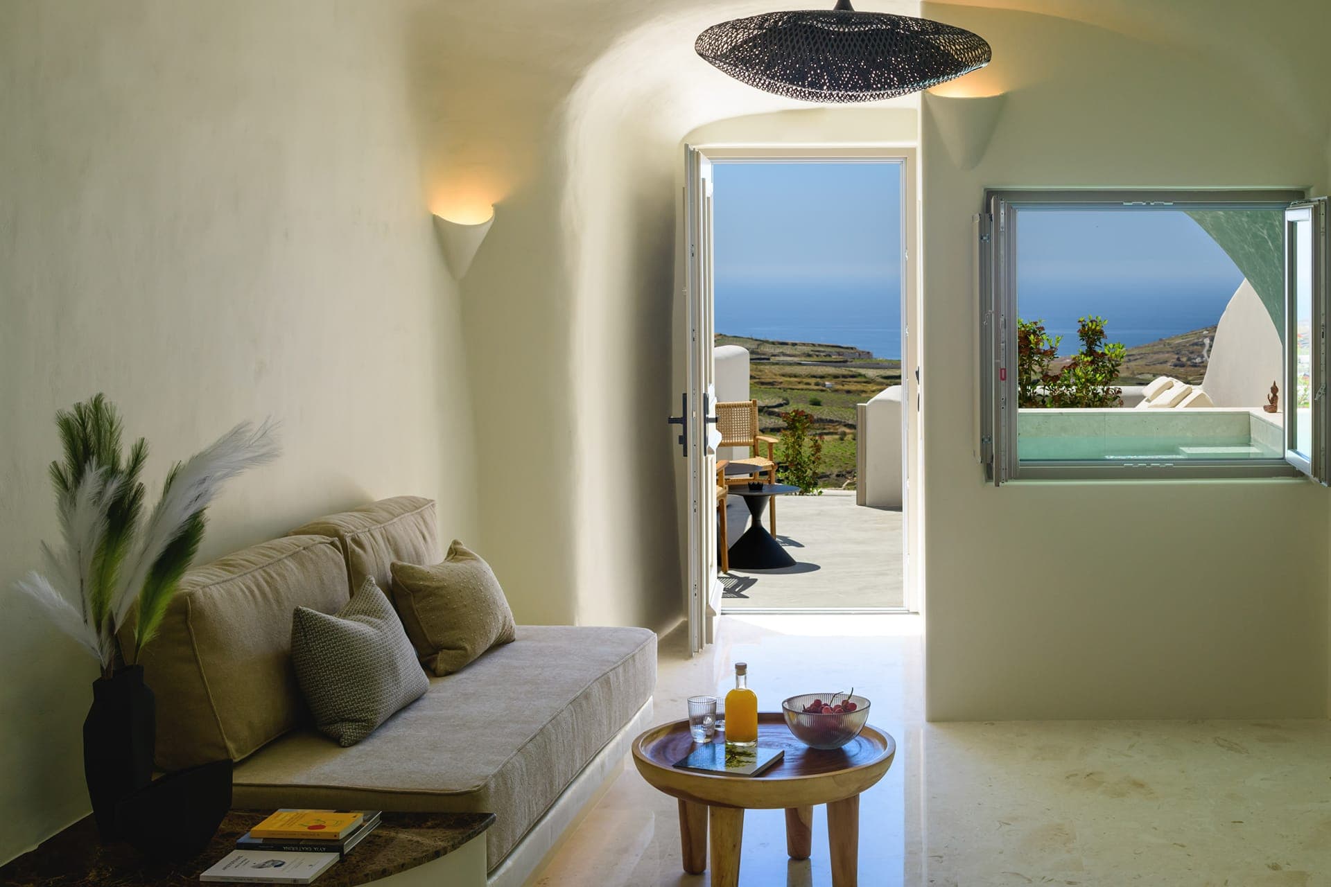 Deluxe Suite with Heated Plunge Pool and Sea View - Open plan suite that opens up to a private veranda furnished veranda