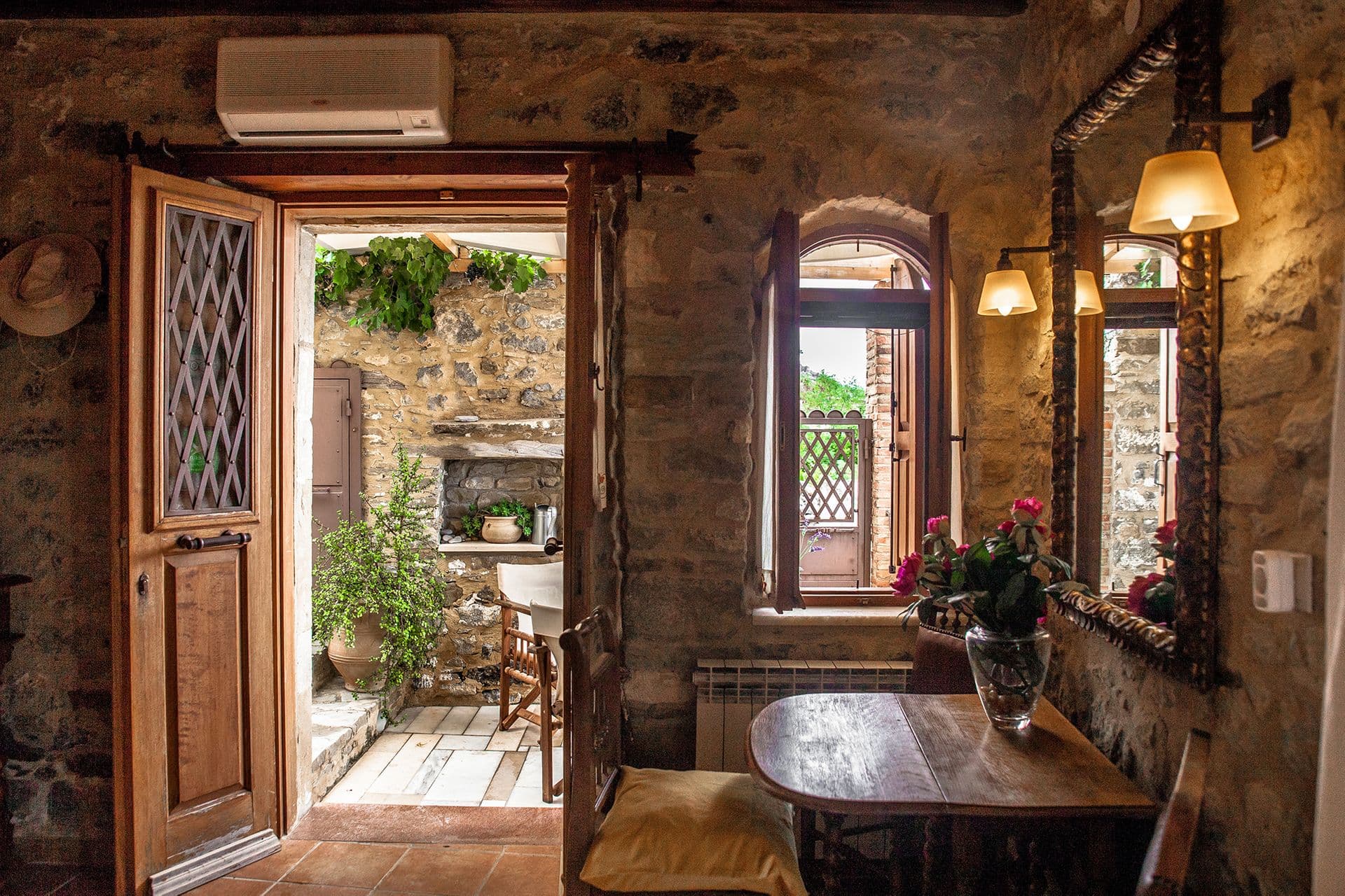 LIVING ROOM OPENS TO COURTYARD