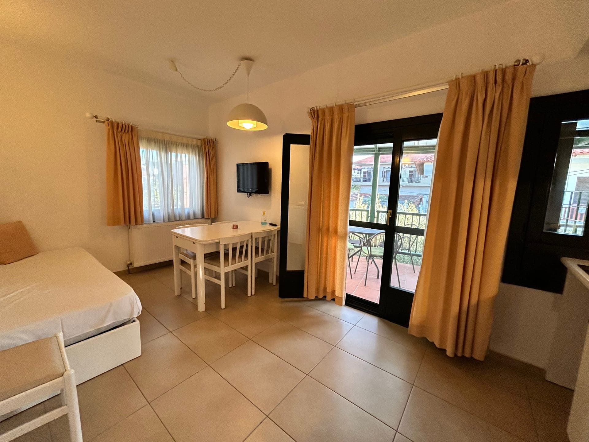 Apartment for 5 Persons, living room with kitchen area and bed for 5th Person