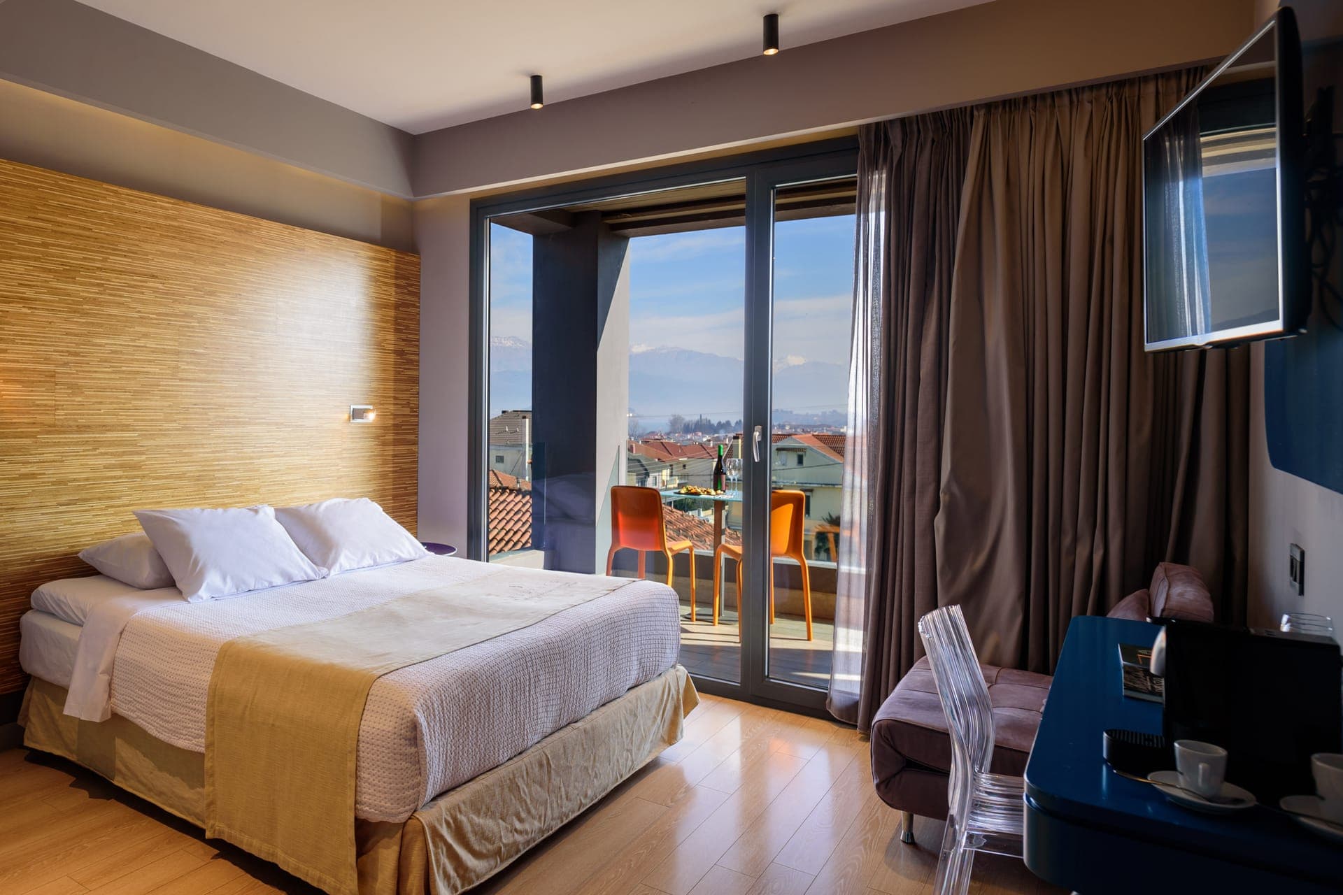 Comfortable bedroom with double bed and working desk