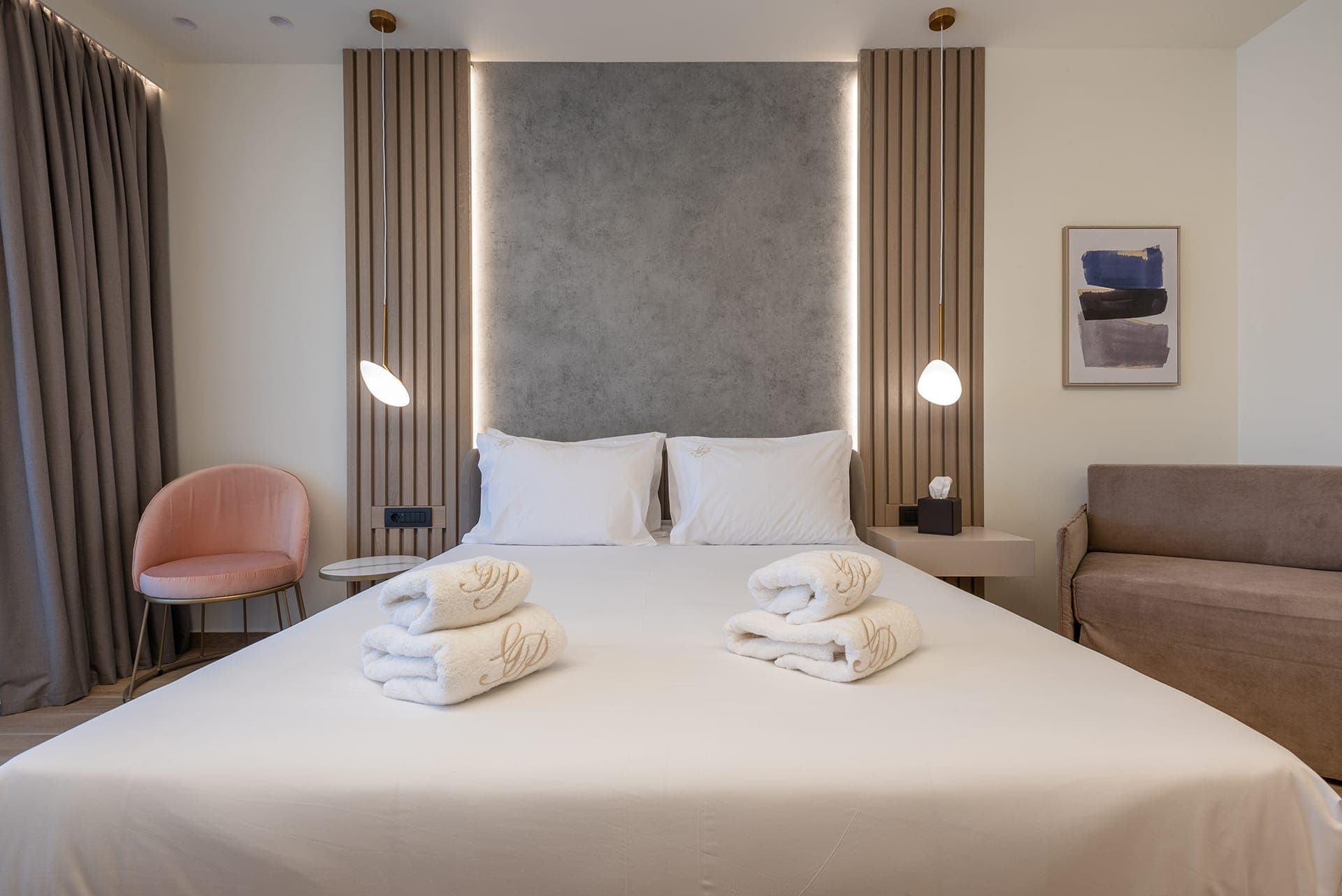 Elegantly designed room featuring a private balcony with mountain and garden views or a terrace with a beautiful private garden, offering comfort, privacy, and a relaxing atmosphere.