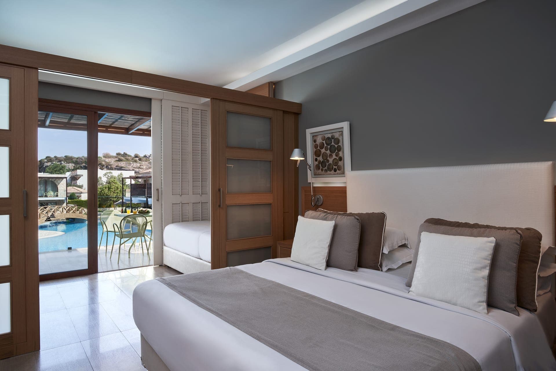 Atlantica Holiday Village Rhodes, Greece -Family Room Sliding Door Pool View (Deluxe Area)