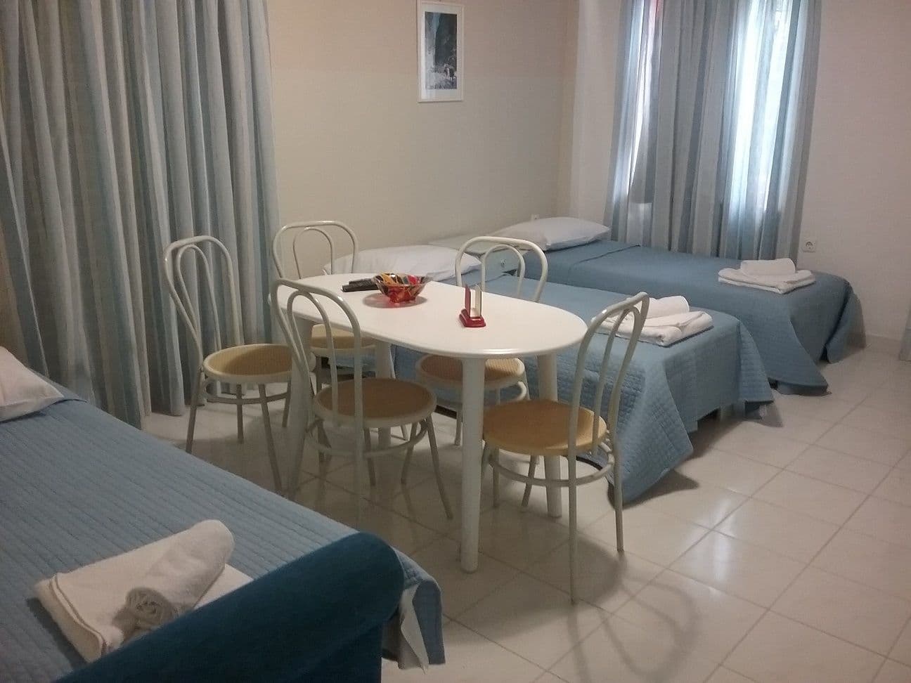 The second bedroom with the dining room and the kitchen