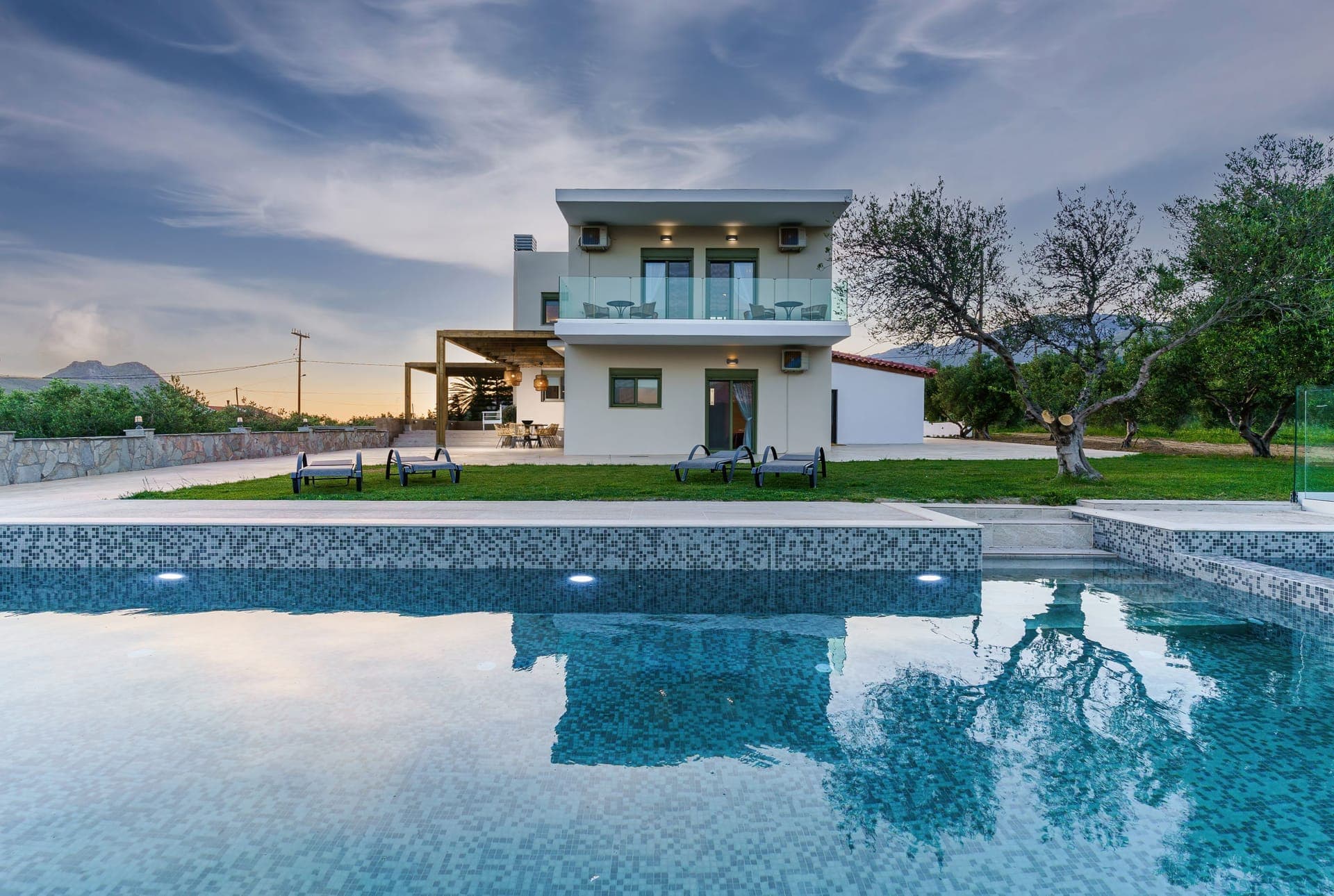Terra Divina Villa and swimming pool in the evening