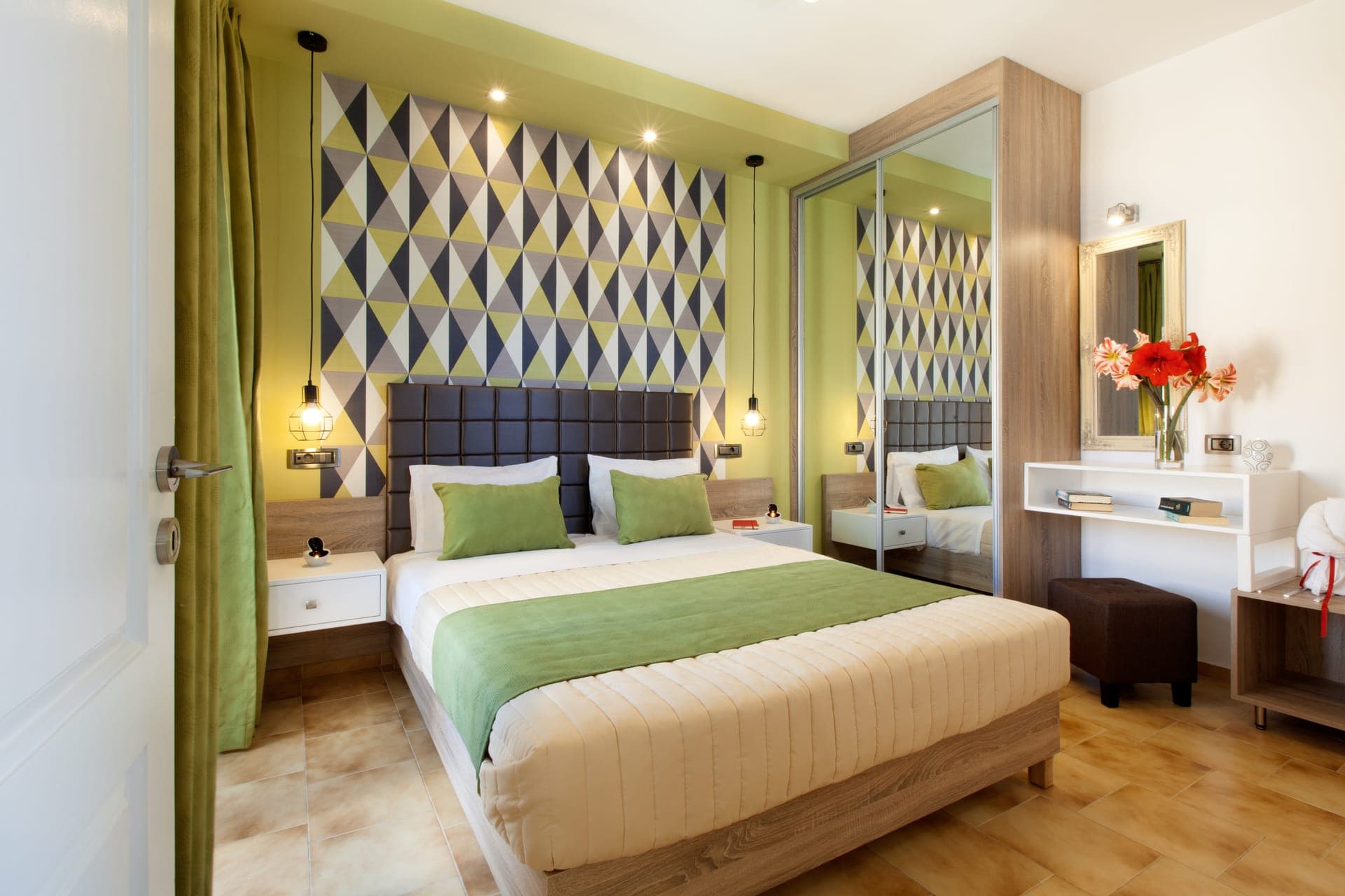 These spacious rooms feature one bedroom with Queen size bed, a living room with 1 comfortable sofa bed and private bathroom. The bedroom and the living room are connected with a door. It also features two balconies, a flat-screen TV, and free Wifi.
