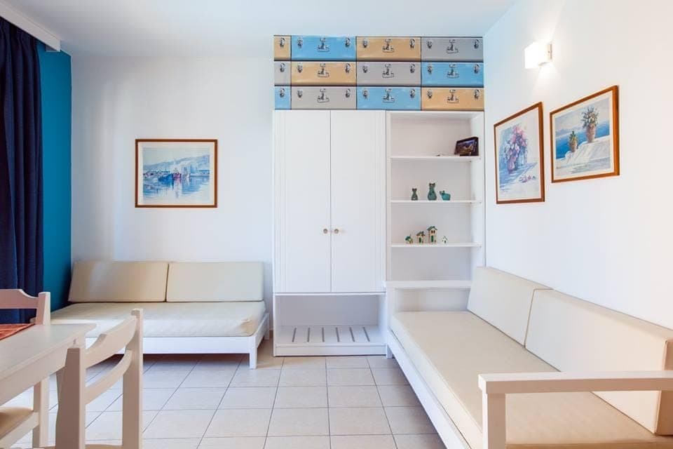 These spacious rooms feature one bedroom with single beds or Queen size bed, a living room with 2 comfortable sofa beds and private bathroom with a bathtub. The bedroom and the living room are connected with a door. It also features two balconies.