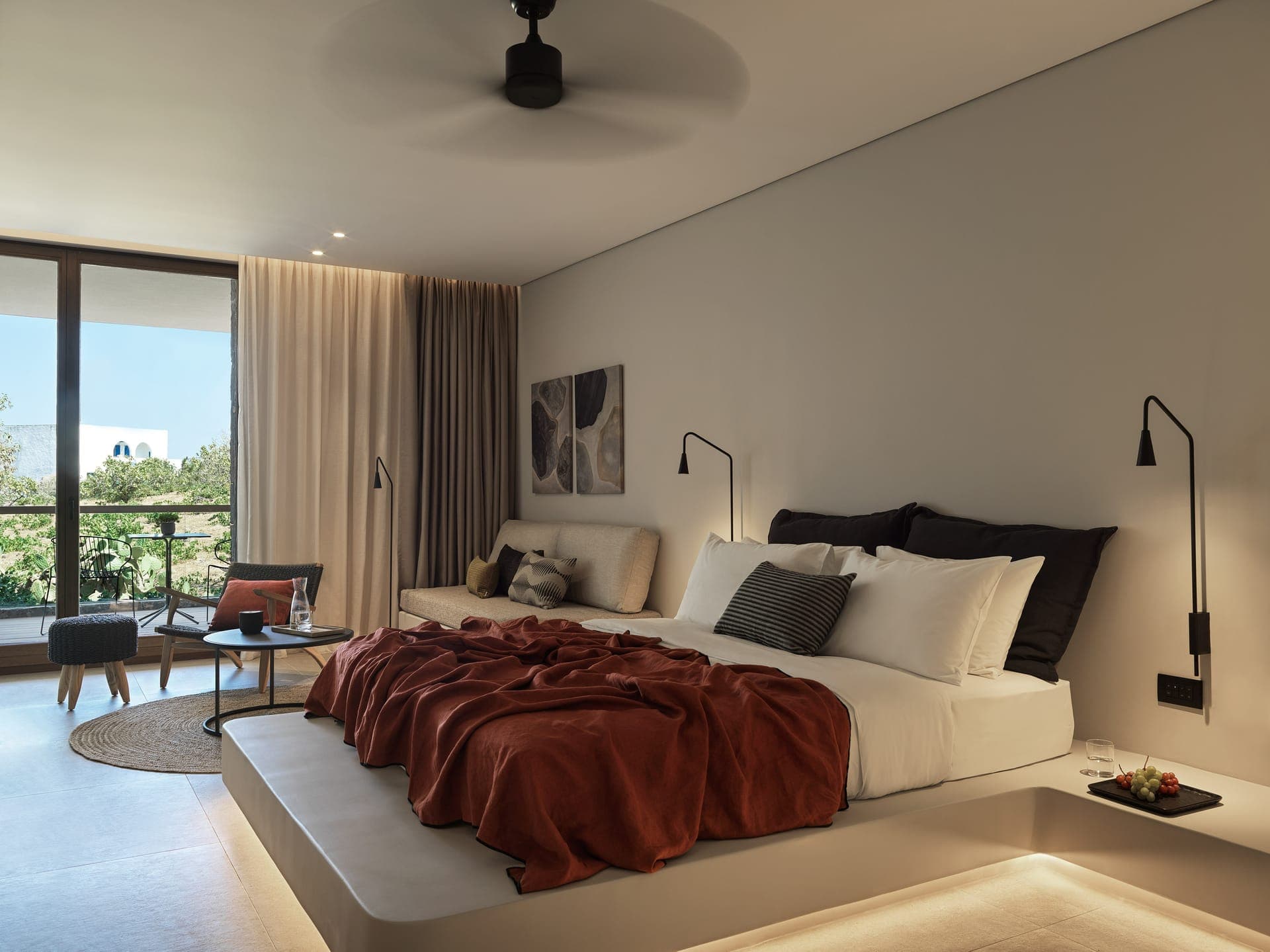 An elegantly decorated 30 sqm (322 sqft) room with king-sized bed, offering modern comfort living, in a chic and relaxed ambience, with all the exclusive amenities that you need. The ideal starting point for your Santorini escape.