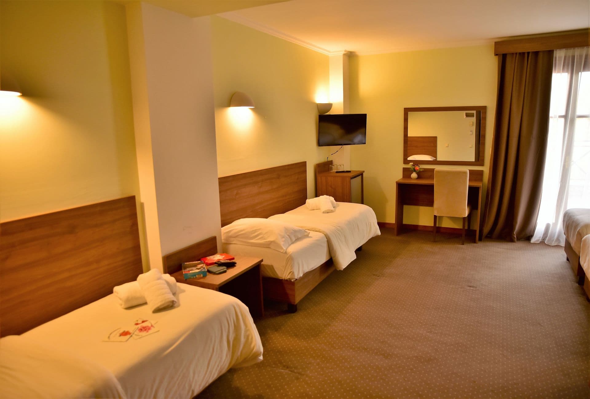 room-types-MONTHELMOS-quad-0.jpg