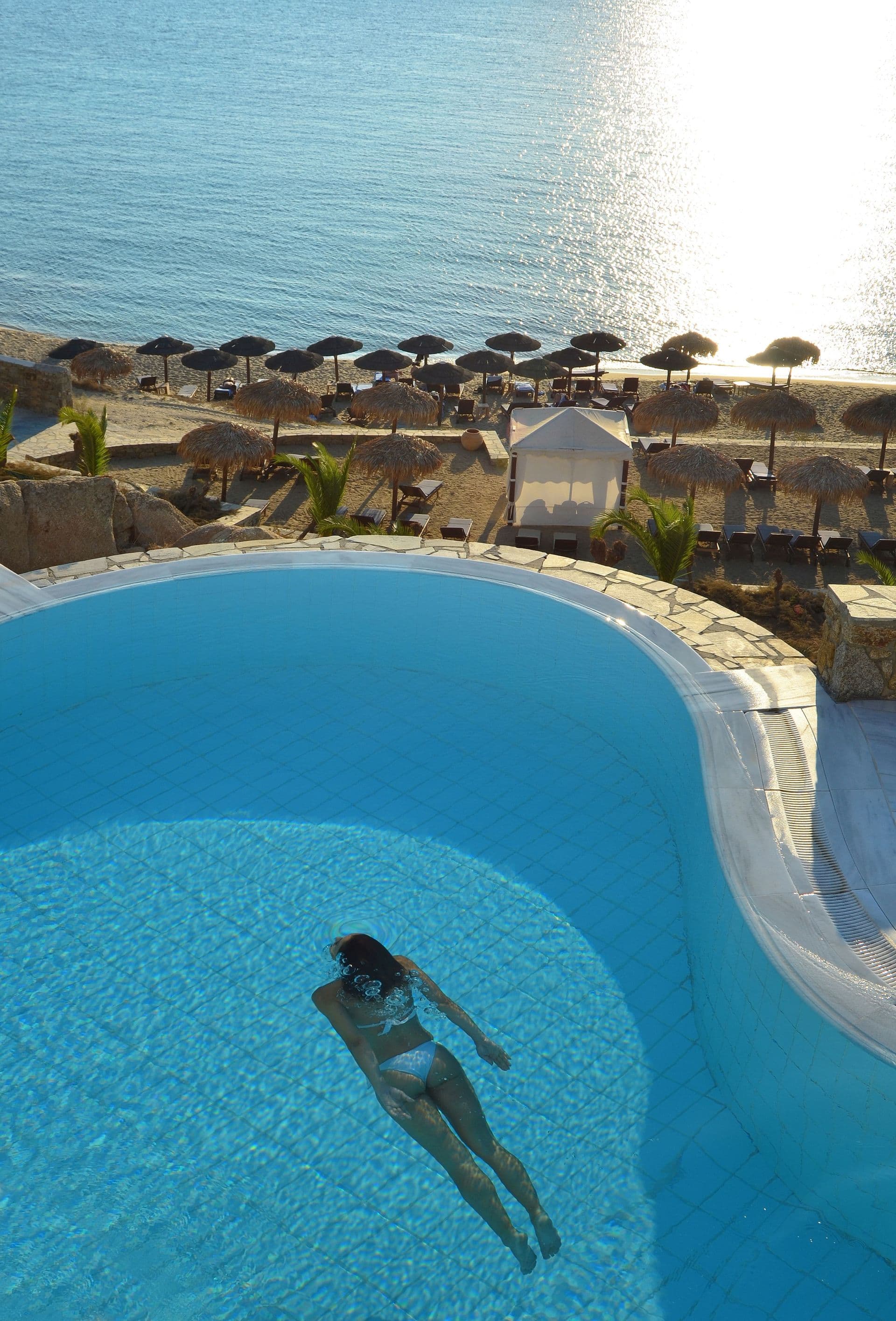 Perched above the golden sand beach just 40 meters away is Deluxe Suite with Private Pool located