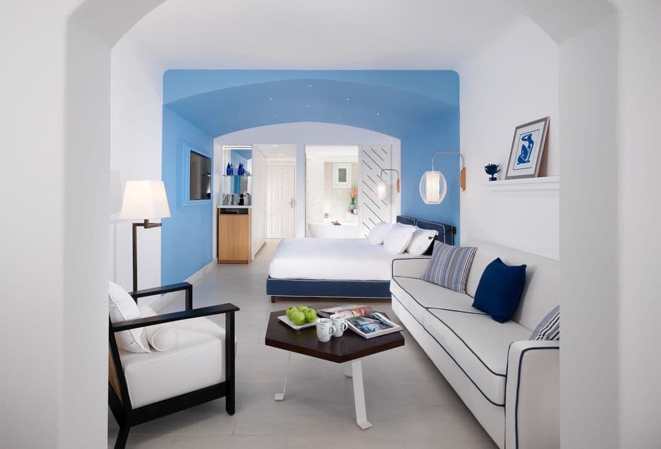 Premium Garden View Room sitting area with sofa bed