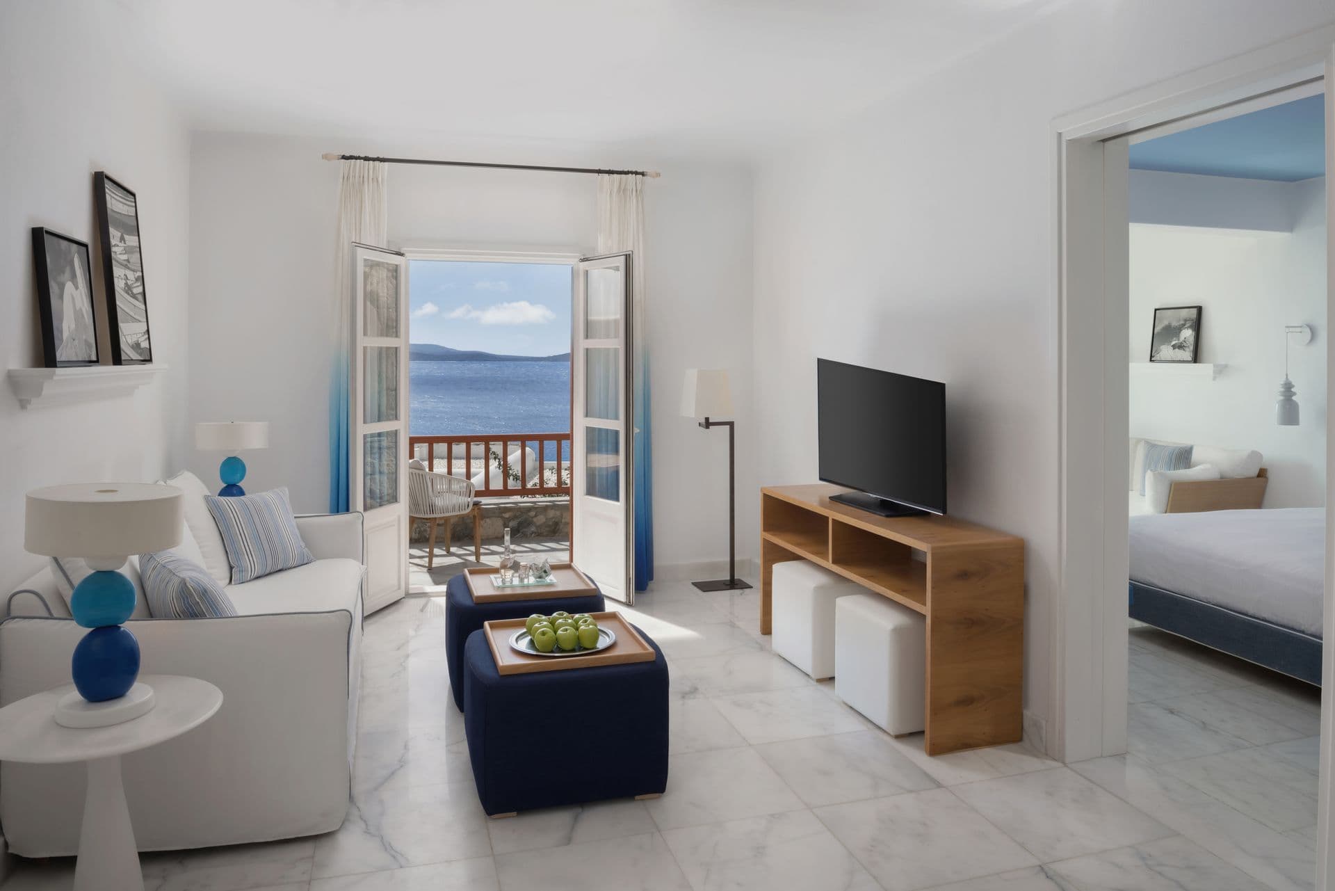 Offer remarkable comfort alongside a terrace with sea views. It consisting of a spacious bedroom and a separate living room that can also accommodate 2 more guests on a queen size sofa bed. Each suite offers a wet bar, dining facilities & 2 bathrooms