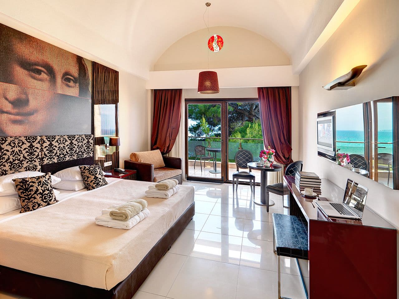 room-types-OLYMSUNSET-DLXSSV-0.jpg