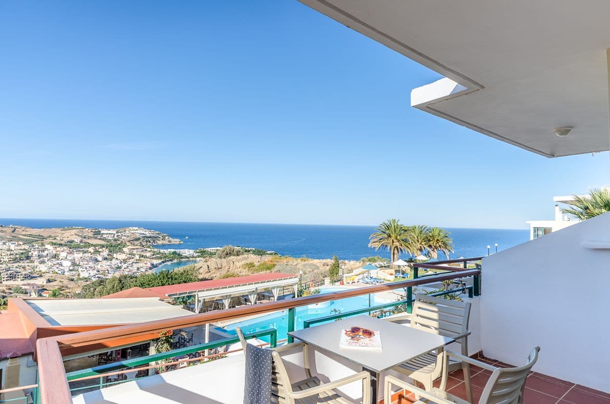 Balcony with sea view and pool view.