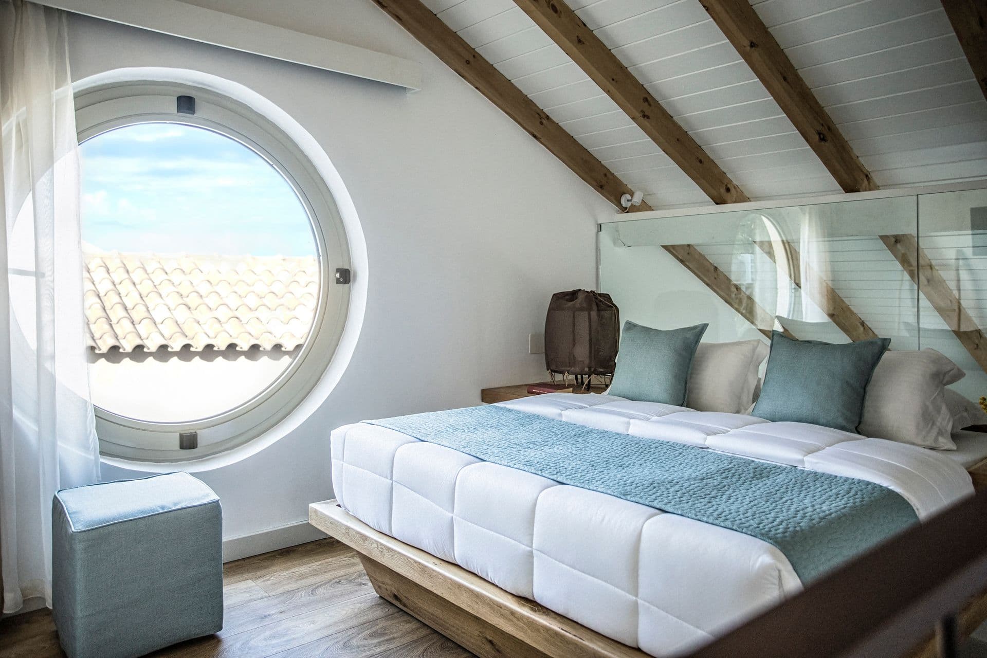 sea view, two-level room: the upper level is only visually separated (as an open balcony), one bathroom + 1wc , usually the main bedroom is located on the upper level, main bed is double, extra bed is a sofa, max . 4 people, 40–44 m2