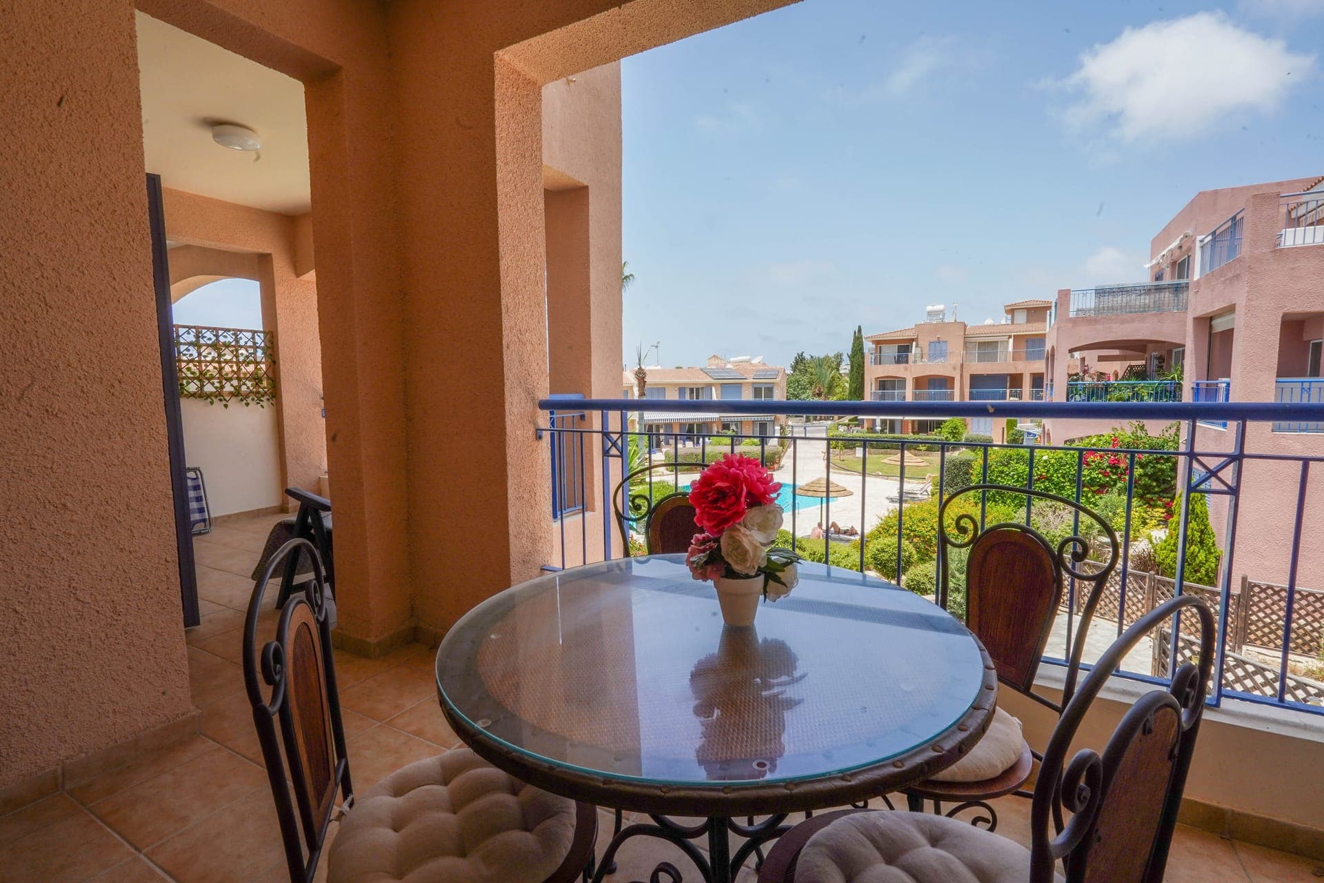Balcony  overlooking the pool and garden area