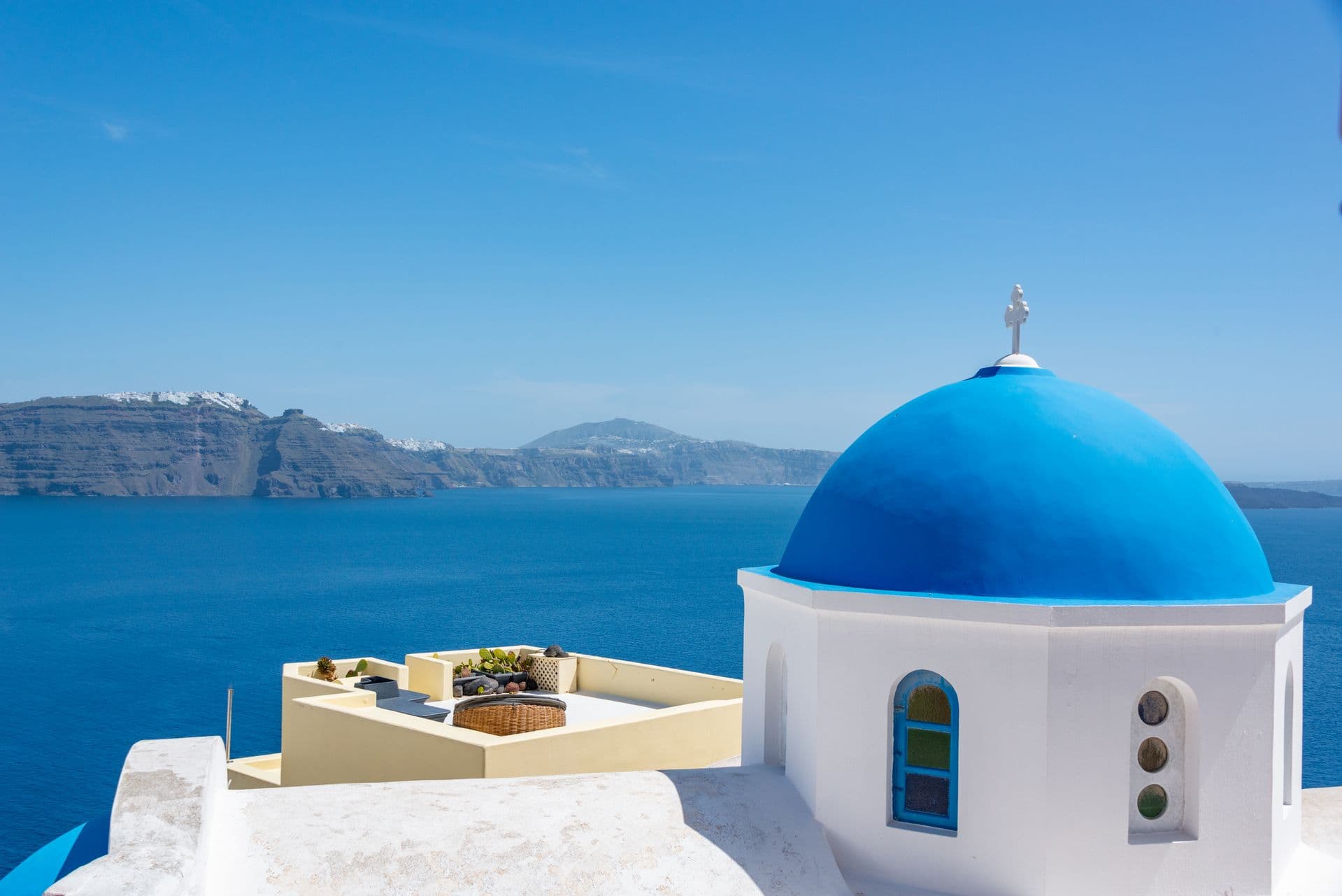 Blue-domed churches overlooking the caldera in Oia, Santorini